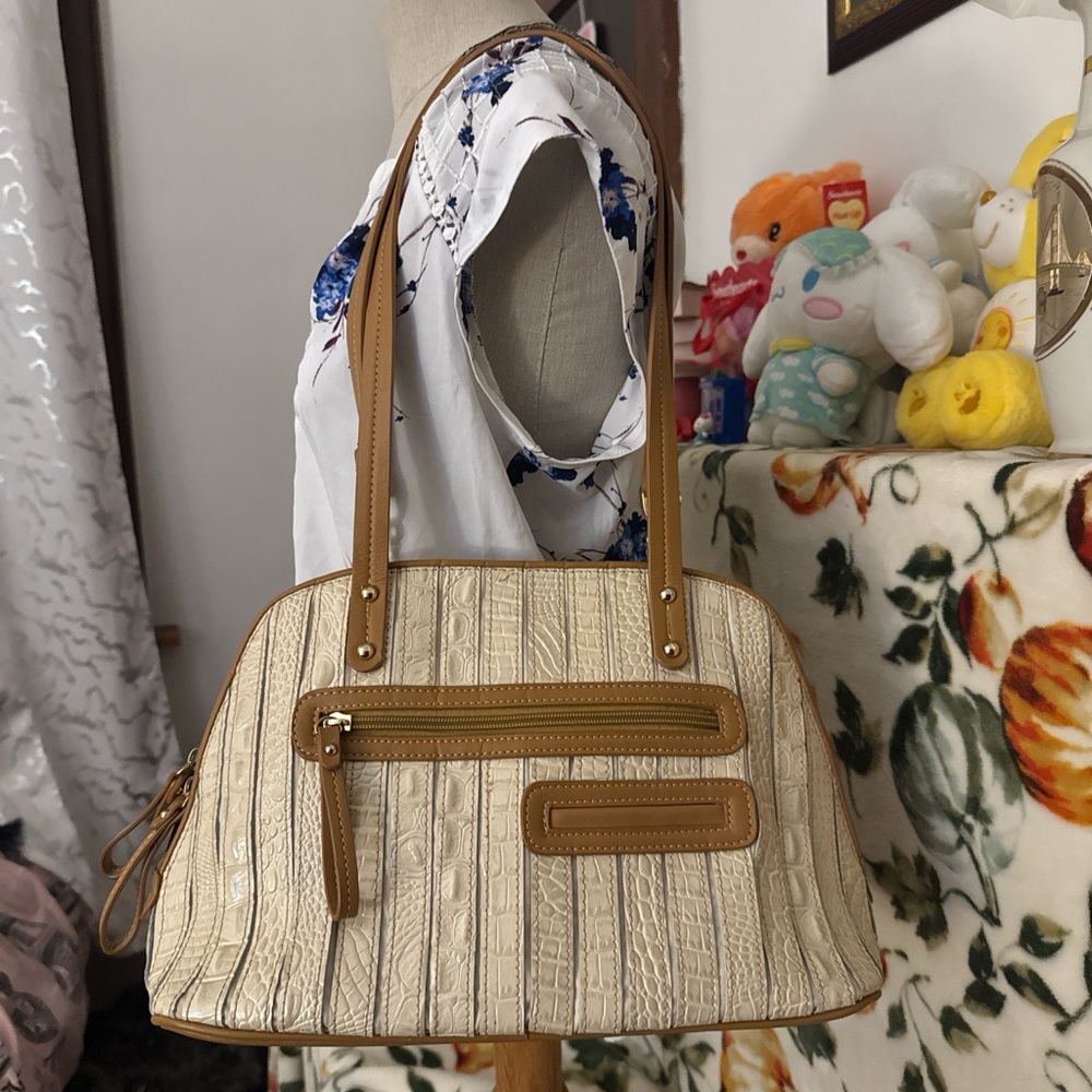 M.C. Handbag
